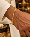 Men's 22K gold ornate linked bracelet, 13.950 g - wrist view